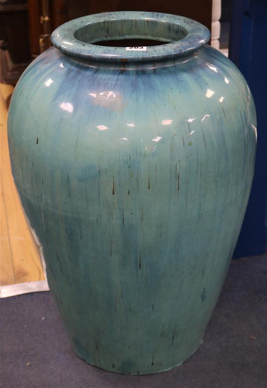 A pair of turquoise glazed inverted pyriform large pottery jars